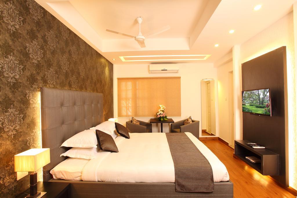 Hotel Luciya Palace Thrissur Rum bild