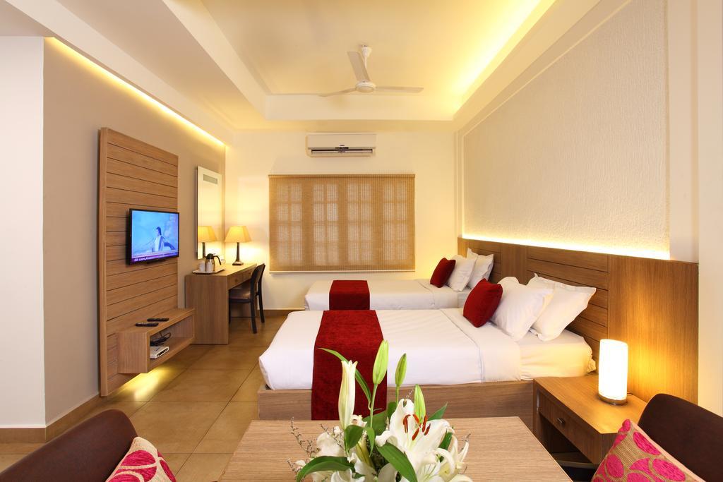 Hotel Luciya Palace Thrissur Rum bild